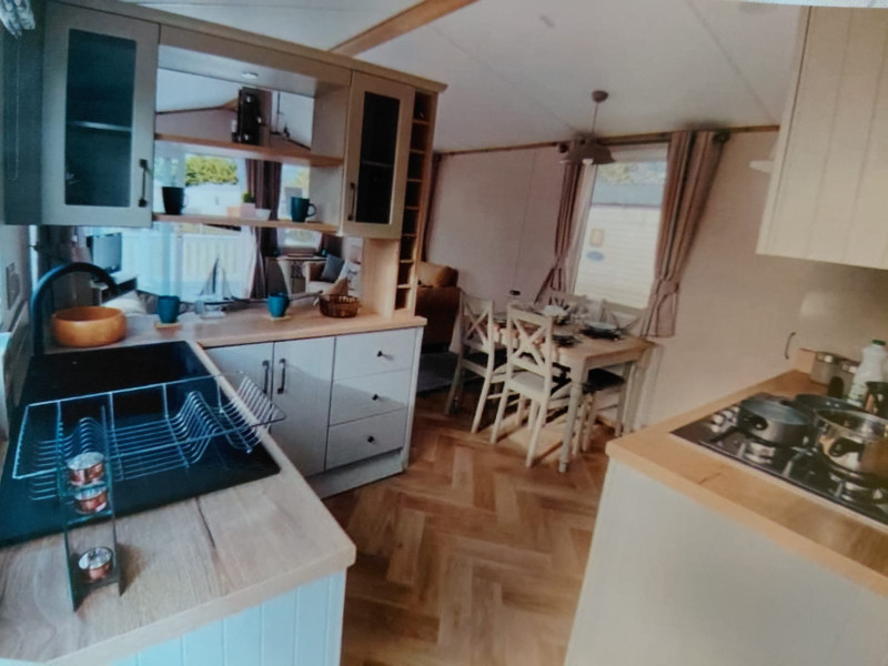 Atlas Debonair 2023 static caravan + deck sited at Seawick Holiday Park, St Osyth, Essex