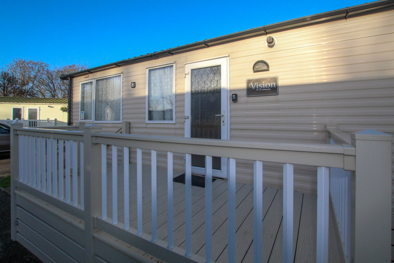 Victory Vision 2014 + decking at Pevensey Bay Holiday Park, East Sussex. 3 bedrooms / 6 berth