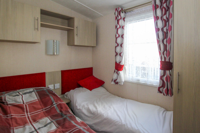 Victory Vision 2014 + decking at Pevensey Bay Holiday Park, East Sussex. 3 bedrooms / 6 berth