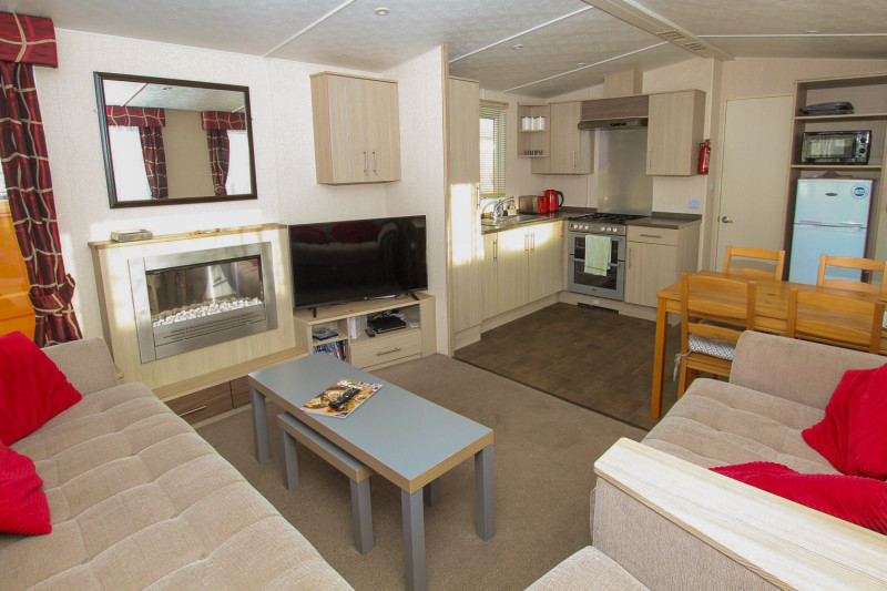 Victory Vision 2014 + decking at Pevensey Bay Holiday Park, East Sussex. 3 bedrooms / 6 berth