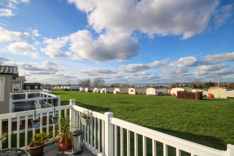 Willerby Avonmore 2017 with decking on a great pitch at Allhallows, Kent
