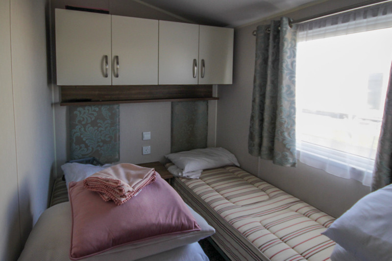 Willerby Avonmore 2017 with decking on a great pitch at Allhallows, Kent