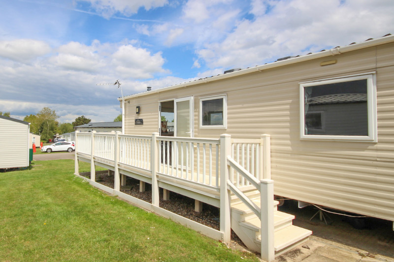 ABI Trieste 2017 static caravan sited at Allhallows, Kent. 3 bedrooms, DG/CH, decking