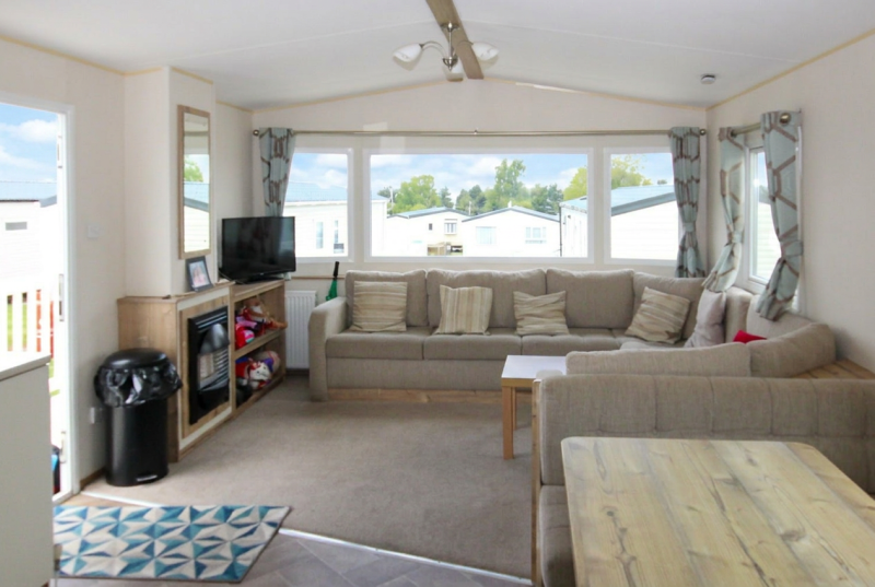 ABI Trieste 2017 static caravan sited at Allhallows, Kent. 3 bedrooms, DG/CH, decking