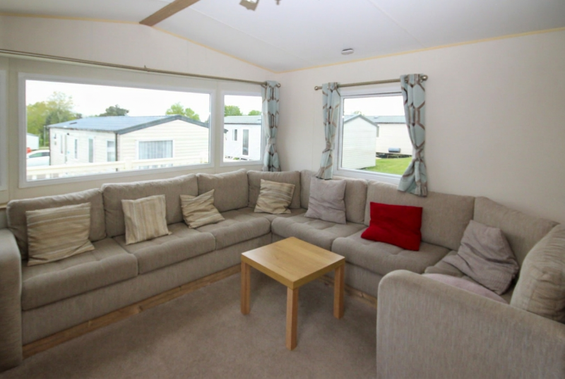 ABI Trieste 2017 static caravan sited at Allhallows, Kent. 3 bedrooms, DG/CH, decking