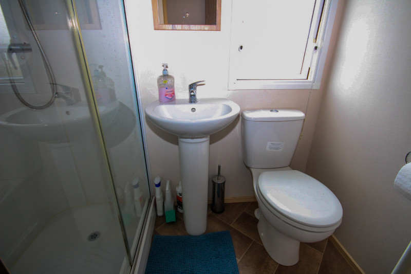 ABI Trieste 2017 static caravan sited at Allhallows, Kent. 3 bedrooms, DG/CH, decking