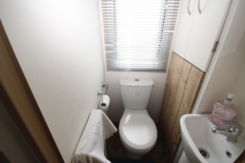 ABI Trieste 2017 static caravan sited at Allhallows, Kent. 3 bedrooms, DG/CH, decking