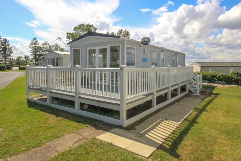 ABI Beachcomber 2012 static caravan at Haven Kent Coast, Allhallows. 2 bedrooms, decking