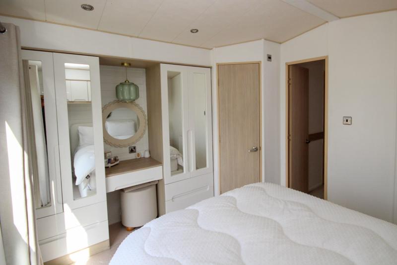 ABI Beachcomber 2012 static caravan at Haven Kent Coast, Allhallows. 2 bedrooms, decking