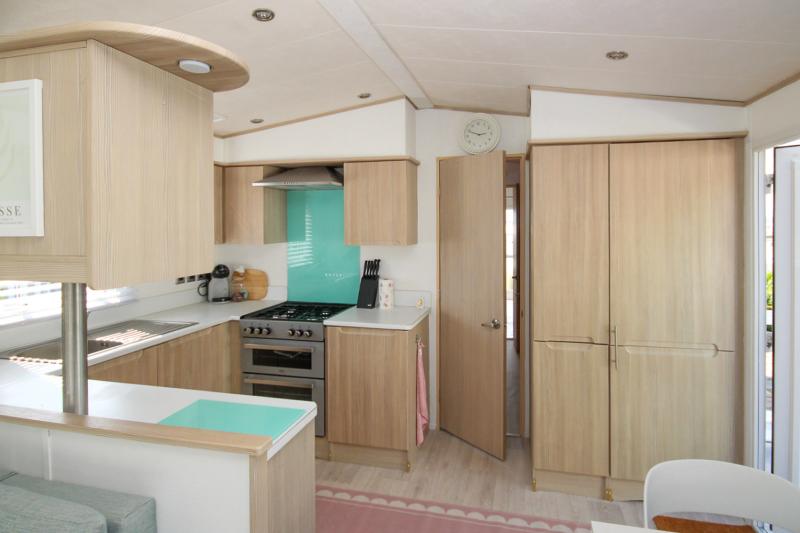 ABI Beachcomber 2012 static caravan at Haven Kent Coast, Allhallows. 2 bedrooms, decking