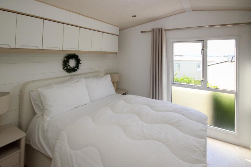 ABI Beachcomber 2012 static caravan at Haven Kent Coast, Allhallows. 2 bedrooms, decking