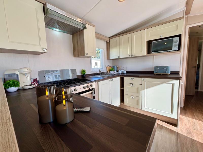 Stunning Swift Adventurer 2016 static caravan sited at Shorefield Country Park,