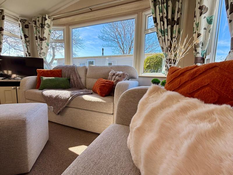 Stunning Swift Adventurer 2016 static caravan sited at Shorefield Country Park,