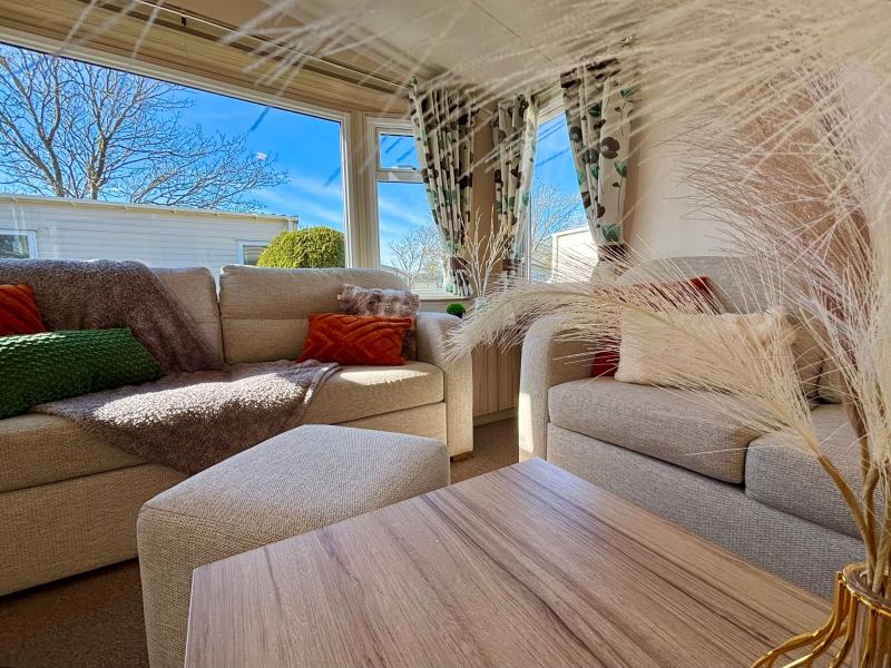 Stunning Swift Adventurer 2016 static caravan sited at Shorefield Country Park,