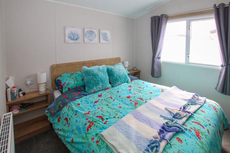 Willerby Grasmere 2022 with decking sited at Seaview Holiday Park, Whitstable, Kent