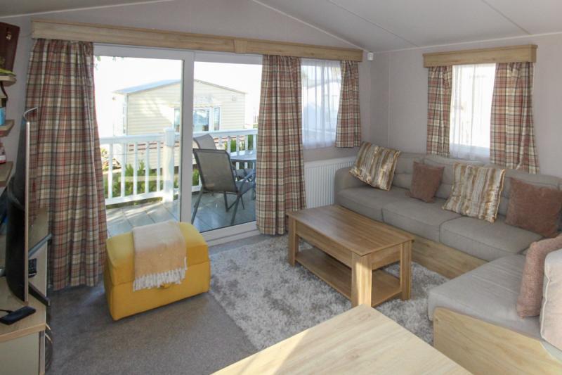 Atlas Mirage 2022 static caravan sited at Haven's Kent Coast Holiday Park, Allhallows. 2 bed, DG/CH, decking