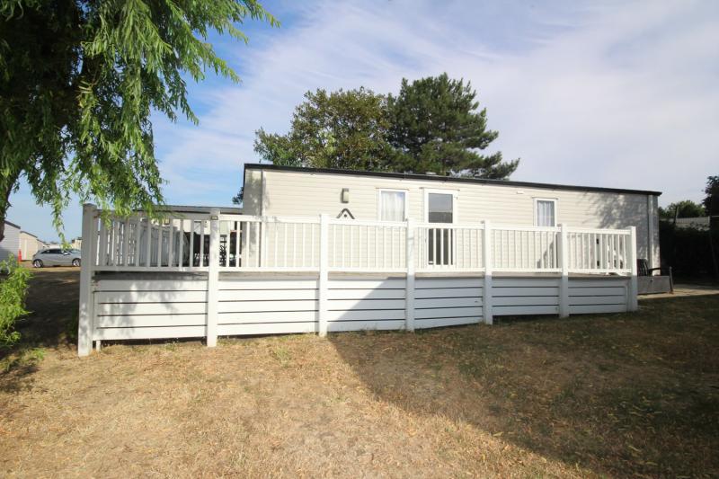 Atlas Mirage 2022 static caravan sited at Haven's Kent Coast Holiday Park, Allhallows. 2 bed, DG/CH, decking