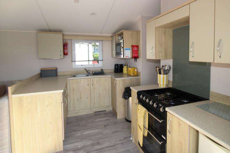 Atlas Mirage 2022 static caravan sited at Haven's Kent Coast Holiday Park, Allhallows. 2 bed, DG/CH, decking