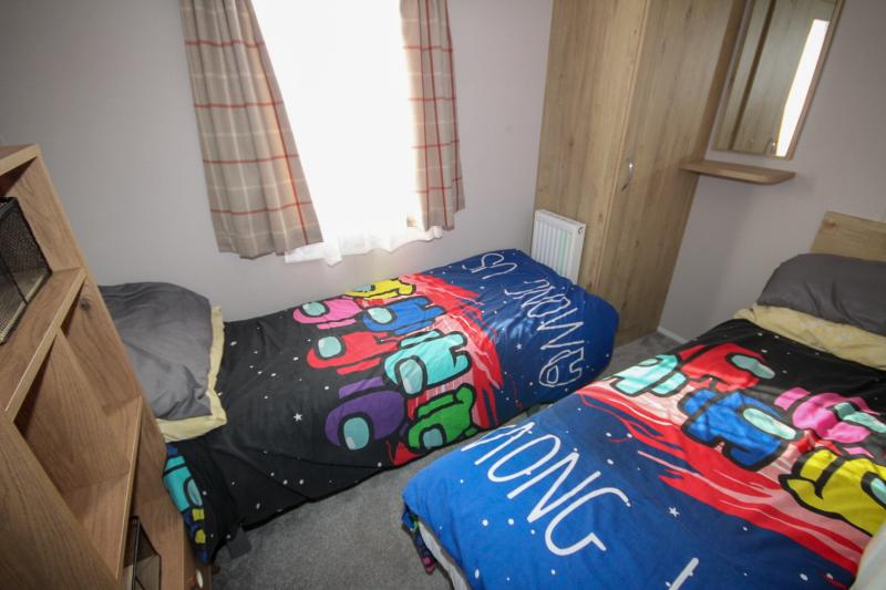 Atlas Mirage 2022 static caravan sited at Haven's Kent Coast Holiday Park, Allhallows. 2 bed, DG/CH, decking