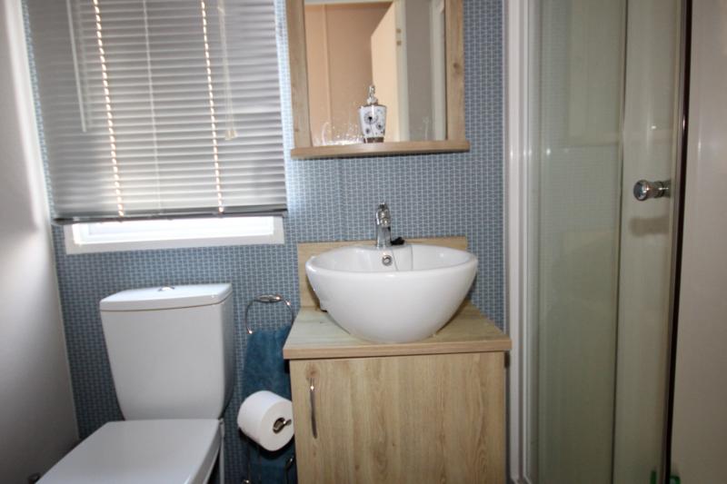 Atlas Mirage 2022 static caravan sited at Haven's Kent Coast Holiday Park, Allhallows. 2 bed, DG/CH, decking