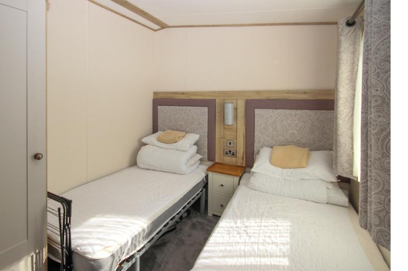 ABI Ambleside 2019 villa-style caravan on a front-row river-view pitch at Allhallows, Kent