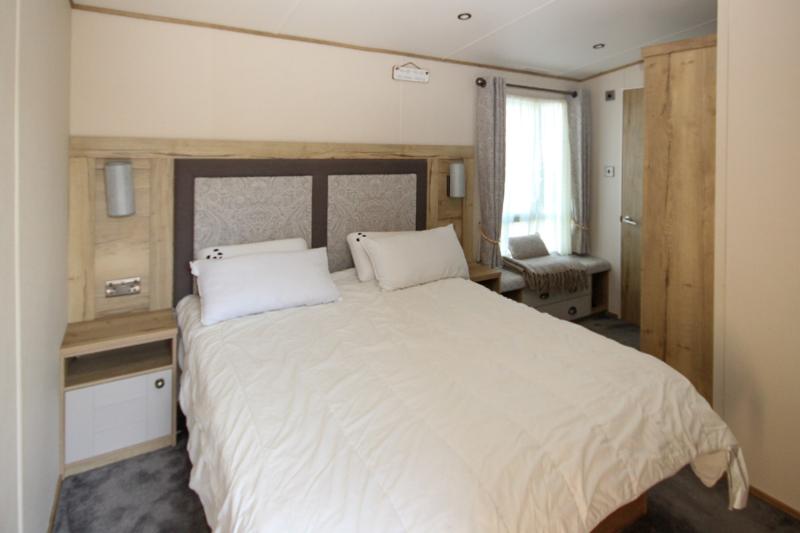 ABI Ambleside 2019 villa-style caravan on a front-row river-view pitch at Allhallows, Kent