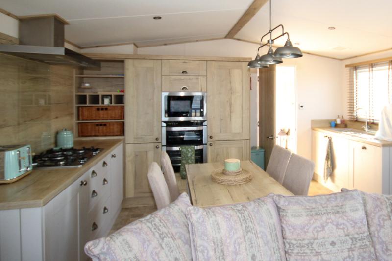 ABI Ambleside 2019 villa-style caravan on a front-row river-view pitch at Allhallows, Kent