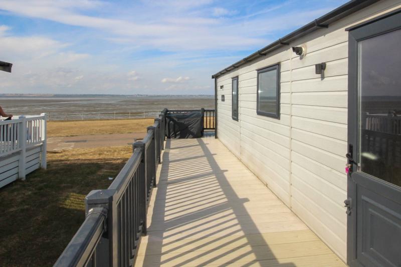 ABI Ambleside 2019 villa-style caravan on a front-row river-view pitch at Allhallows, Kent