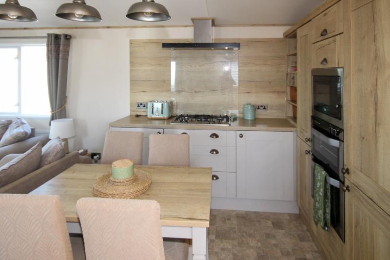 ABI Ambleside 2019 villa-style caravan on a front-row river-view pitch at Allhallows, Kent