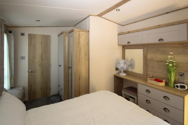 ABI Ambleside 2019 villa-style caravan on a front-row river-view pitch at Allhallows, Kent